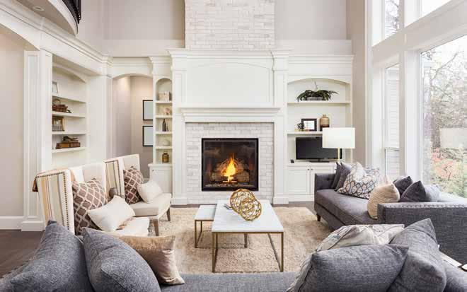 Hingucker und Heiz-Effekt: Ein Kamin fügt sich harmonisch ins gemütliche Wohnzimmerambiente. Foto: bmak/Adobe Stock Hingucker und Heiz-Effekt: Ein Kamin fügt sich harmonisch ins gemütliche Wohnzimmerambiente. Foto: bmak/Adobe Stock