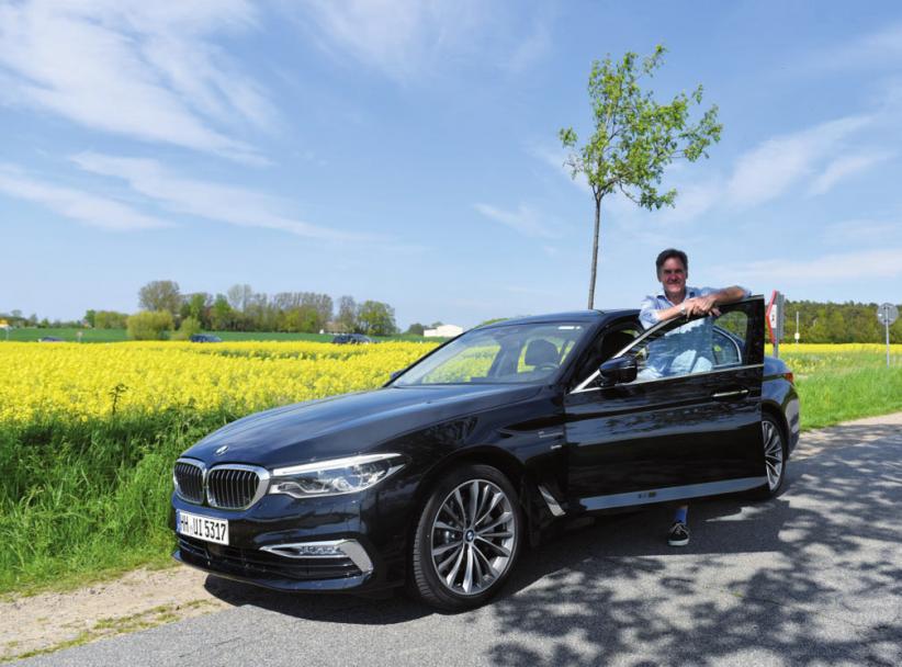 KLÖNSCHNACK-Redakteur Schwalbach mit 5er BMW auf derRückfahrt von einem Ausflug an die See