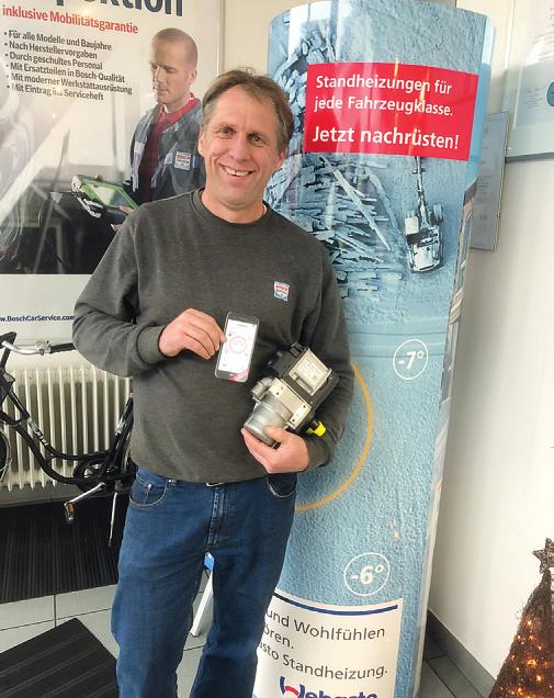 Jörn Hellfritsch vom Bosch-Service in Pinneberg präsentiert eine Standheizung, die per App auf dem Smartphone oder Tablet gesteuert werden kann Foto: Skibbe Jörn Hellfritsch vom Bosch-Service in Pinneberg präsentiert eine Standheizung, die per App auf dem Smartphone oder Tablet gesteuert werden kann Foto: Skibbe