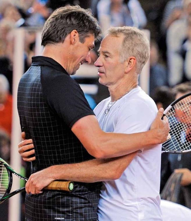 Michael Stich und John McEnroe triumphierten 1992 im Doppel in Wimbledon. Das Finale dauerte 5:01 Stunden Michael Stich und John McEnroe triumphierten 1992 im Doppel in Wimbledon. Das Finale dauerte 5:01 Stunden