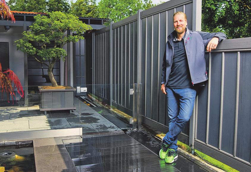 Naturmaterial für den Garten: Das Holzverbundmaterial wird mit seiner lebendigen Marmorierung zum Blickfang. Foto: djd/megawood.de/whoiswolf Naturmaterial für den Garten: Das Holzverbundmaterial wird mit seiner lebendigen Marmorierung zum Blickfang. Foto: djd/megawood.de/whoiswolf